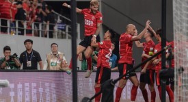 北京国安队足协杯四强争夺战失利，河南崛起压力山大困境挑战